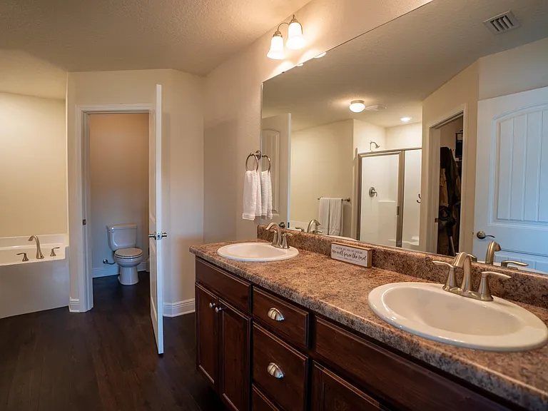 Master bathroom with walk in closet