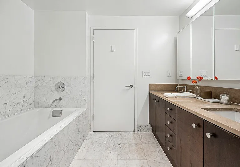 Elevate your daily routine with the modern elegance of Arbor's stylish bathroom. Featuring sleek finishes, ample storage, and a relaxing tub, this space blends comfort and functionality seamlessly. Schedule your visit today!