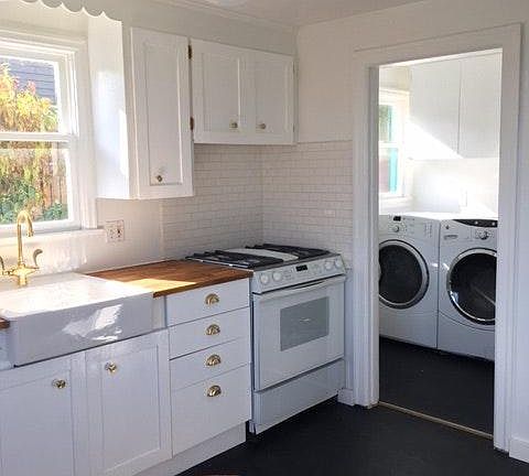 Laundry room attached to kitchen, now separated by cute butl