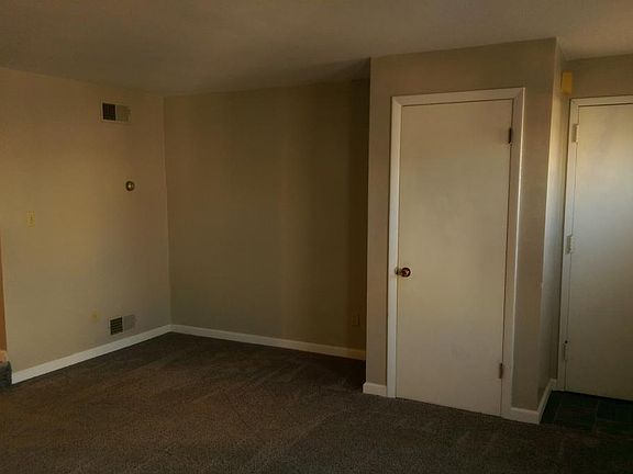Living Room freshly painted and new carpet