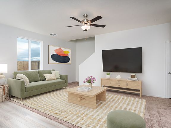 The family room is off of the kitchen and dining room.