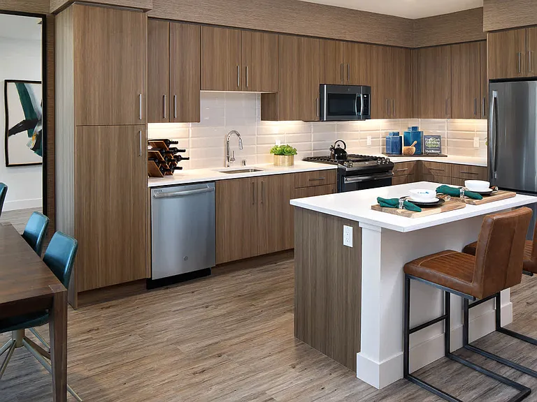 Kitchen with Stainless Steel Appliances and Quartz Countertops