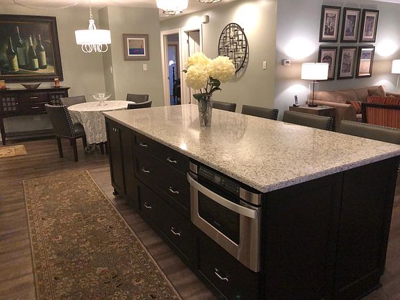 Kitchen is open to dining area and living area