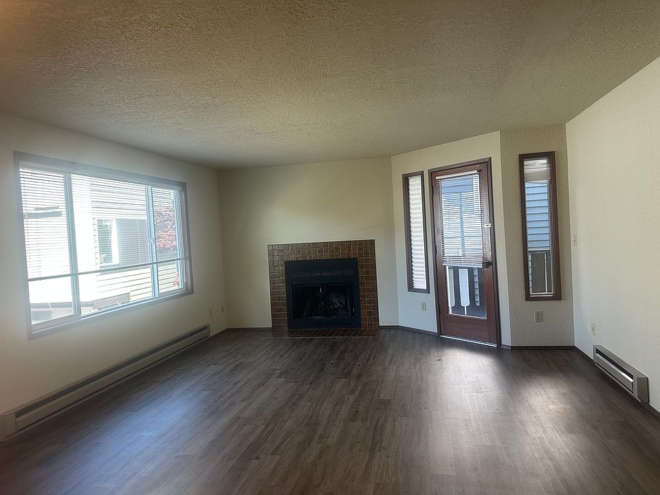 Spacious Living room and the door leads out to balcony.