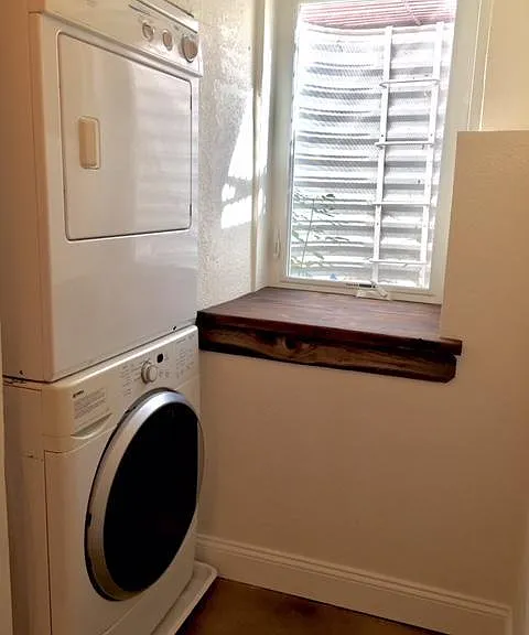 Washer and dryer in unit/ egress window