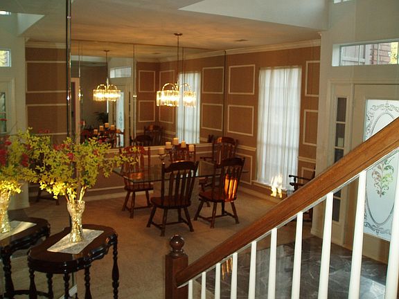 Notice the etched glass front door and architectural detailing.