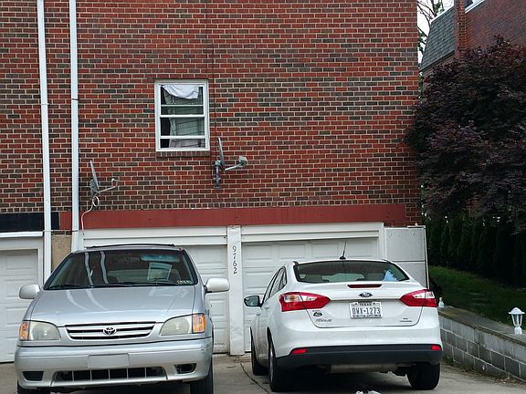 Exterior parking and 1 car garage interior parking