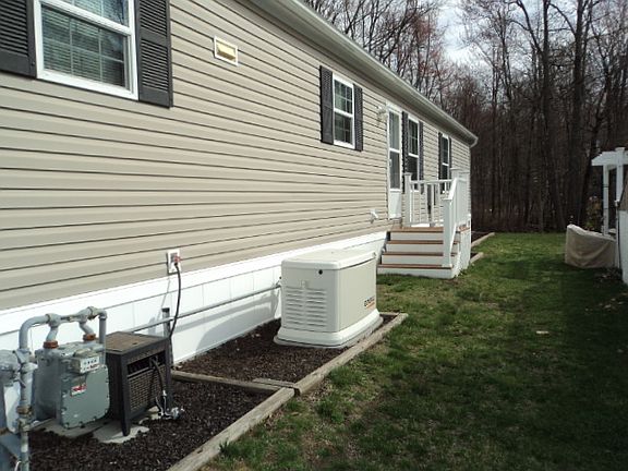 Exterior Image-4-Champion Redman D R Village