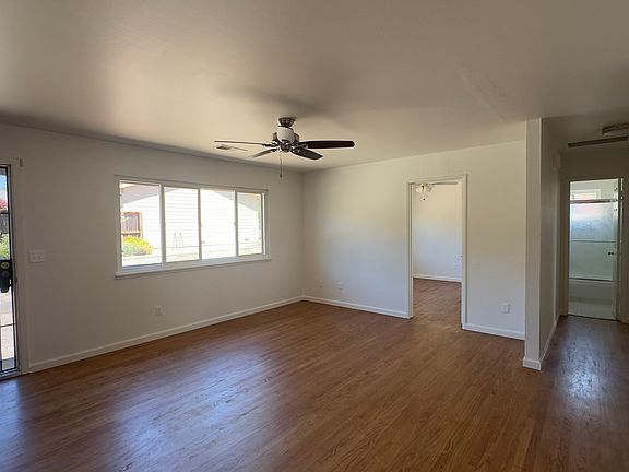 Living room toward front bedroom and hall.