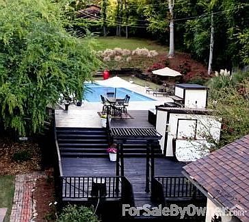 Backyard pool and deck : Backyard view from House across the backyard