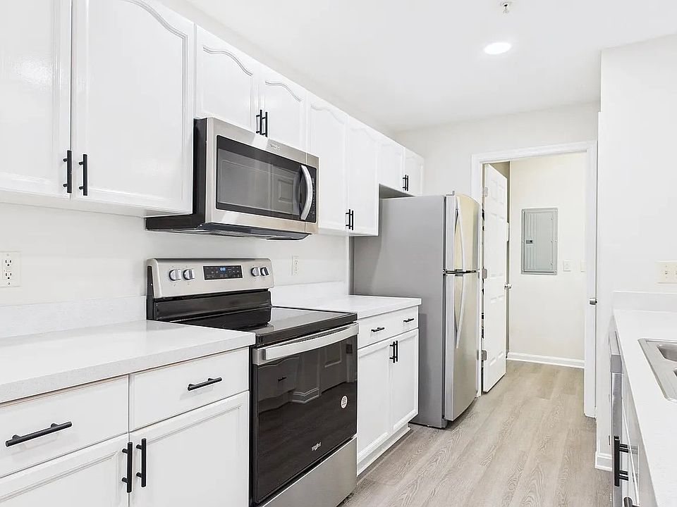 Kitchen is bright and fully equipped with every amenity a family of four needs.