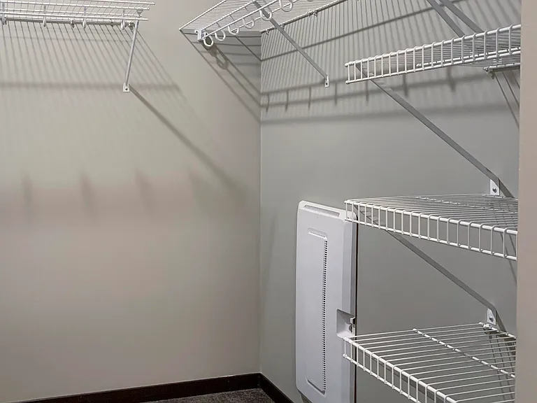 Large walk-in closets offer plenty of space to keep your wardrobe organized and store your clothing, shoes, and accessories.