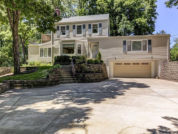 EXPANDED DRIVEWAY & EXTRA WALKWAYS! PERFECT FOR ENTERTAINING!!