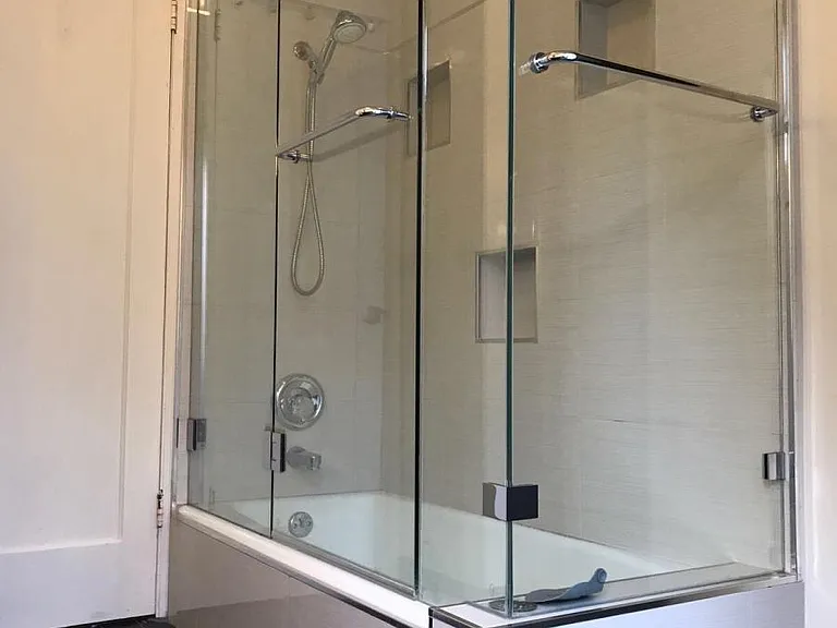 Master bathroom with tub and shower