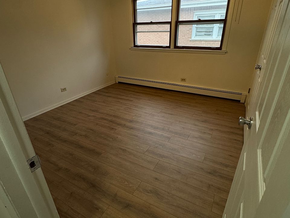 Bedroom one with nice size closet. Ceiling fan for additional light and air/heat.