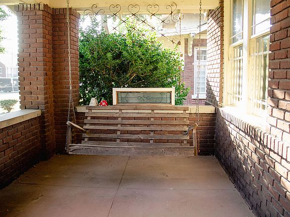 Large front porch with relaxing swing.