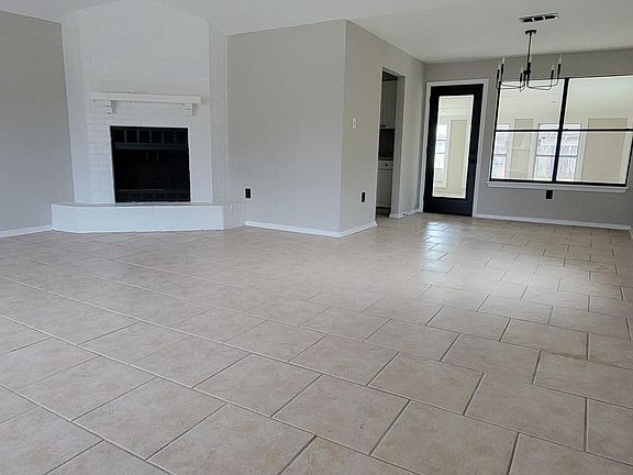 Open Floor Plan and Wood Burning Fireplace