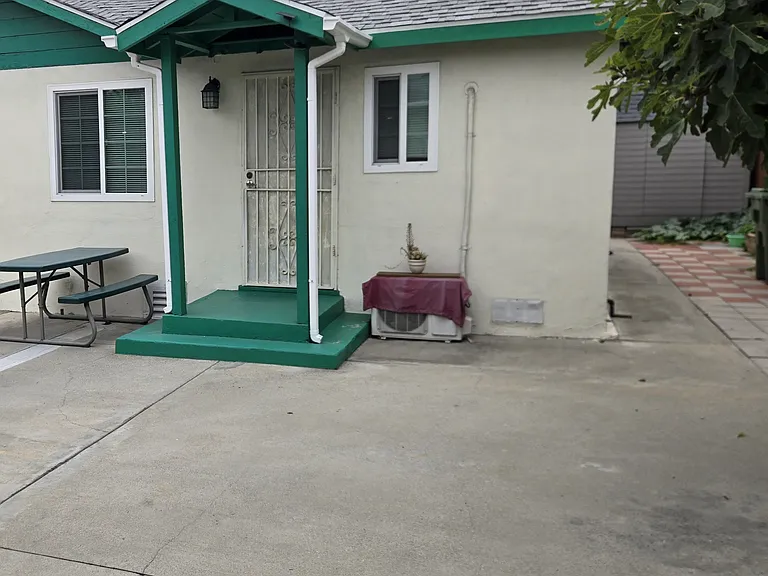 Middle House, front door view. Garage not included