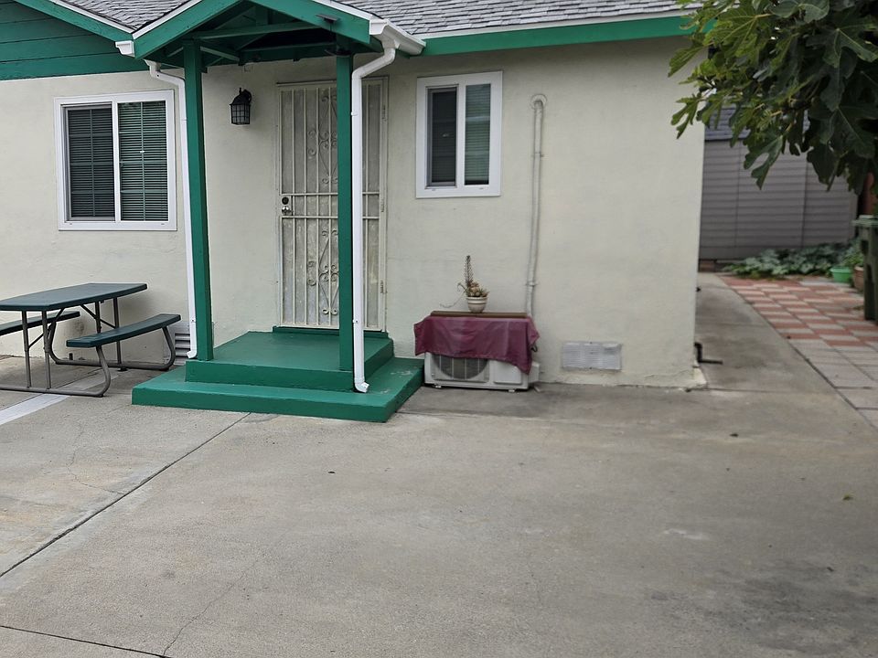Middle House, front door view. Garage not included