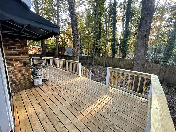 Deck in fenced back yard
