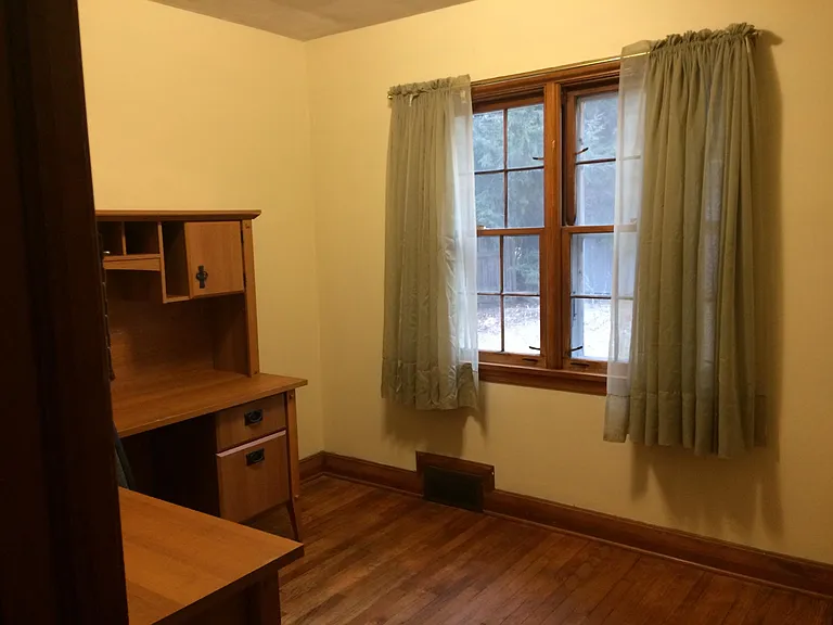 bedroom/office at center of house, facing the backyard (8.5' x 9')
