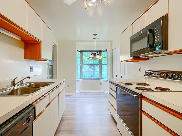 Light Filled Kitchen with almost new Fridge and Dishwasher