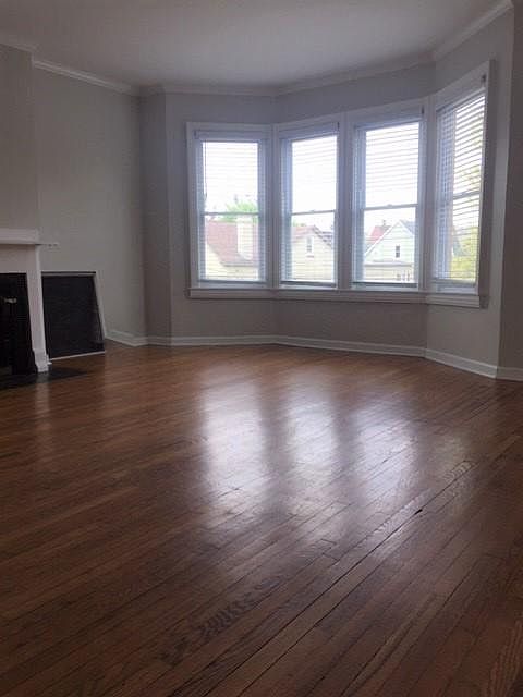 HUGE Living room, great front view, fire place