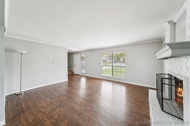 Living Room with fireplace and fresh paint.