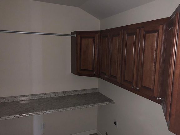 Landray and Pantry room with lots of cabinets