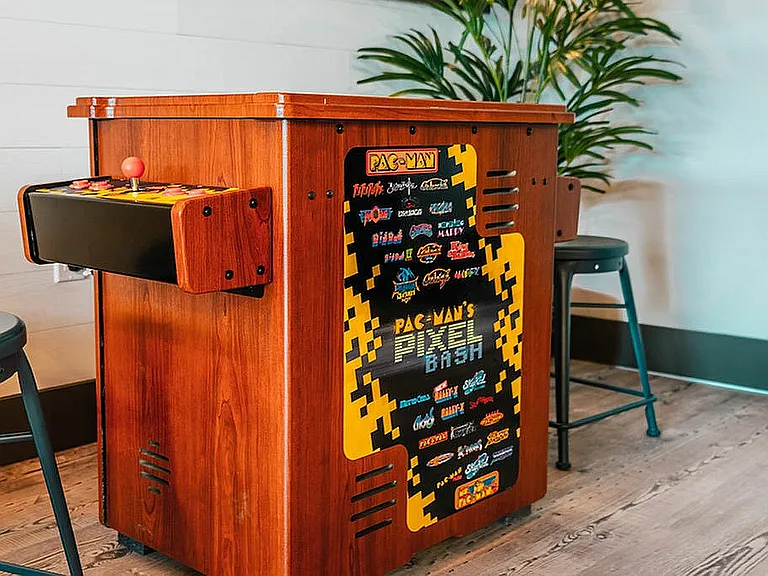 Step back in time with this retro arcade game, adding charm and fun to any space.