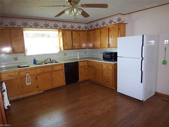 Kitchen window looks to the front of the house.