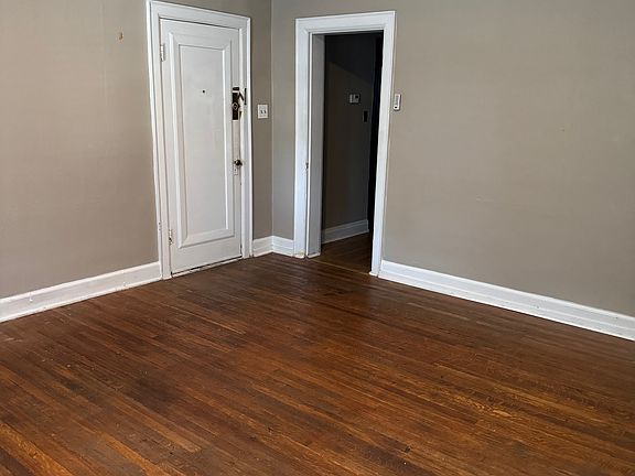 Living room looking to exit to hallway