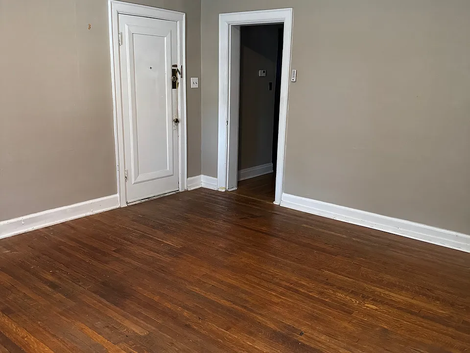 Living room looking to exit to hallway