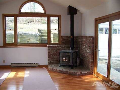 Fantastic Family Room with Skylights & Wood-Burning Stove