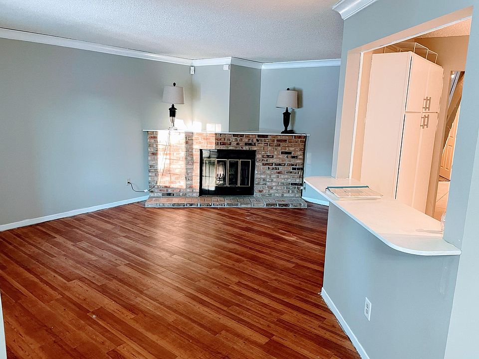 Living room with wood fireplace