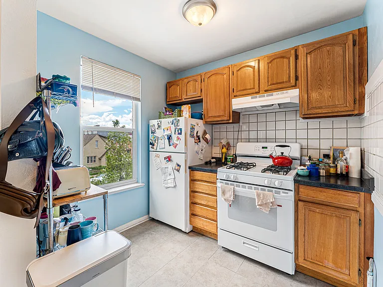 Kitchen is adorable and an efficient use of space with great storage.