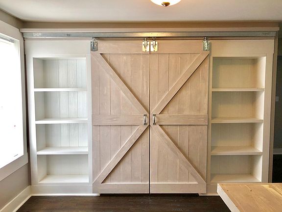 Dining room with plenty of shelf storage - hip double barn d