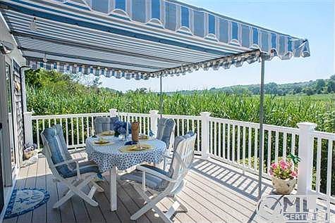 Dining al fresco with views of the marsh.