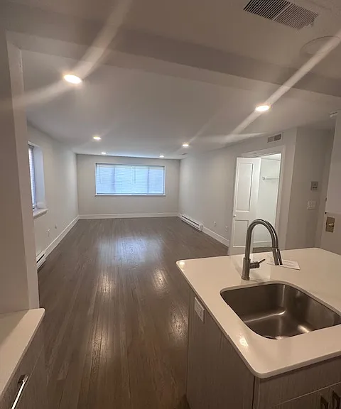 310 Hammond Pond Pkwy #103 — Photo 11