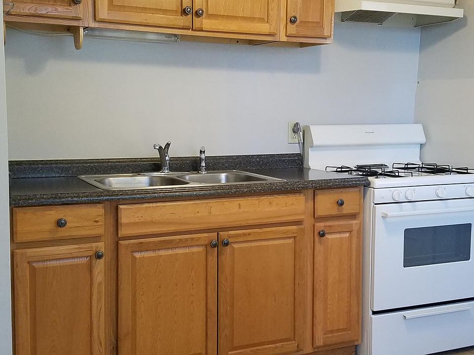 Kitchen includes stove and refrigerator.