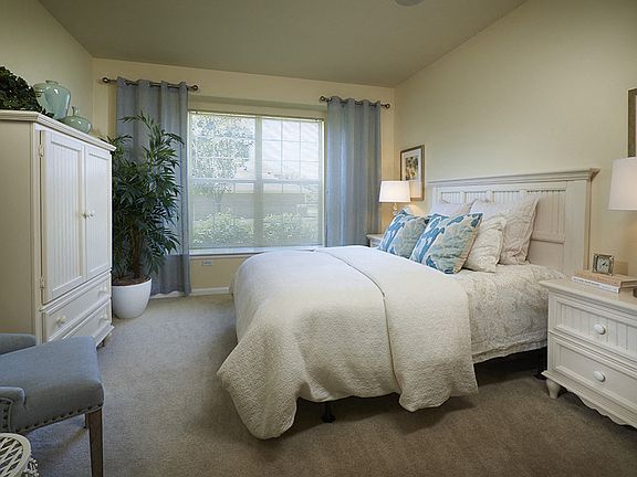 Bedrooms feature spacious walk-in closets