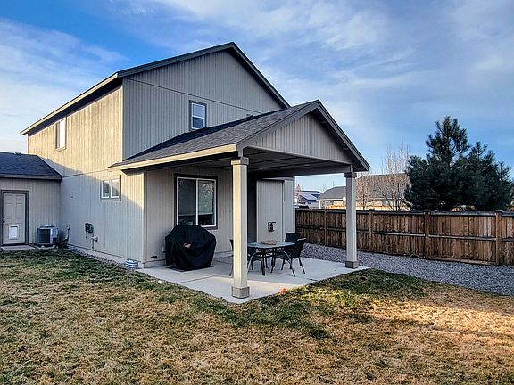 Back yard with covered patio
