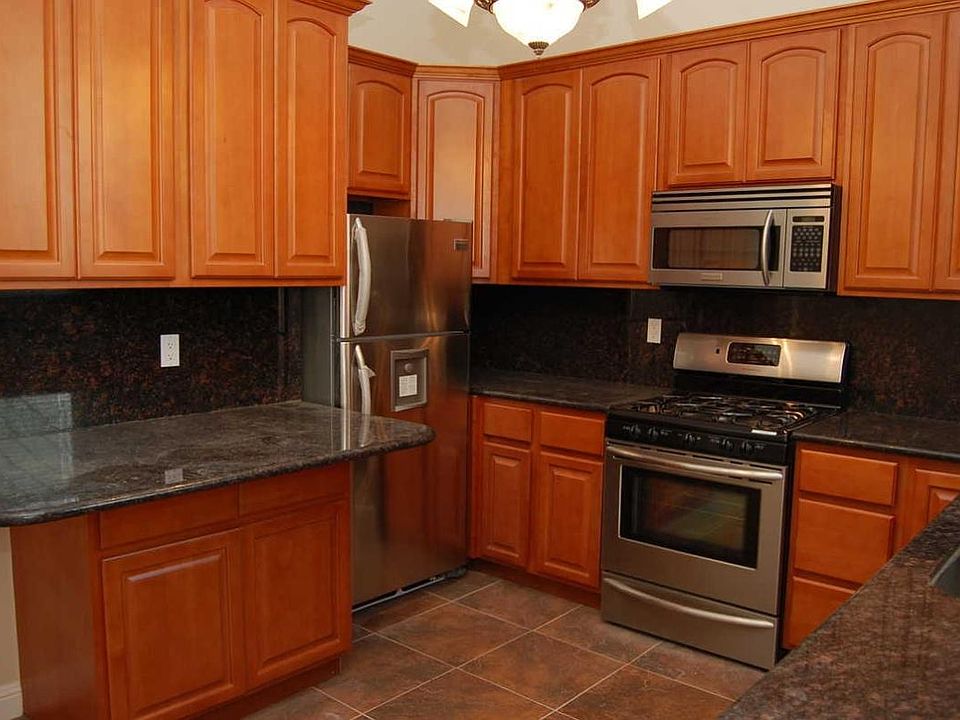 Beautiful Gourmet Kitchen all stainless steel appliances tri