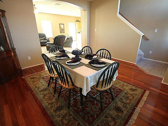Beautiful formal dining room with Brazilian hardwood floors.