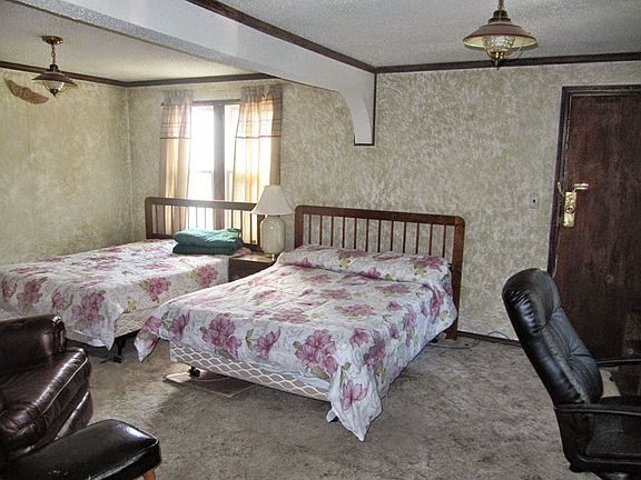 The living area is spacious with an exit of it's own it's just currently is set up as a bedroom. 