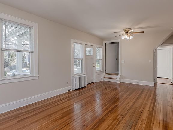 Living Room with gleaming hardwood floors.