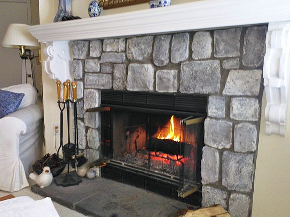 Stone wood-burning fireplace