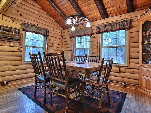 Dining Aea. Gleaming, natural, untreated beams.