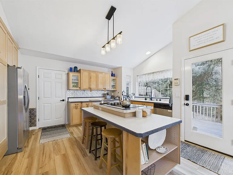 +Appliances new as of 2025
+Coffee bar
+Dishwasher
+Fridge/Freezer, Cook top (4)(electric), Microwave, Oven
+Garbage Disposal
+Seating for 3 at the bar