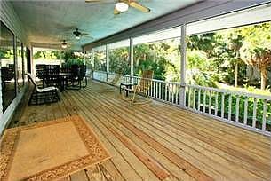 Screened Back Porch overlooking Pool(width of house)